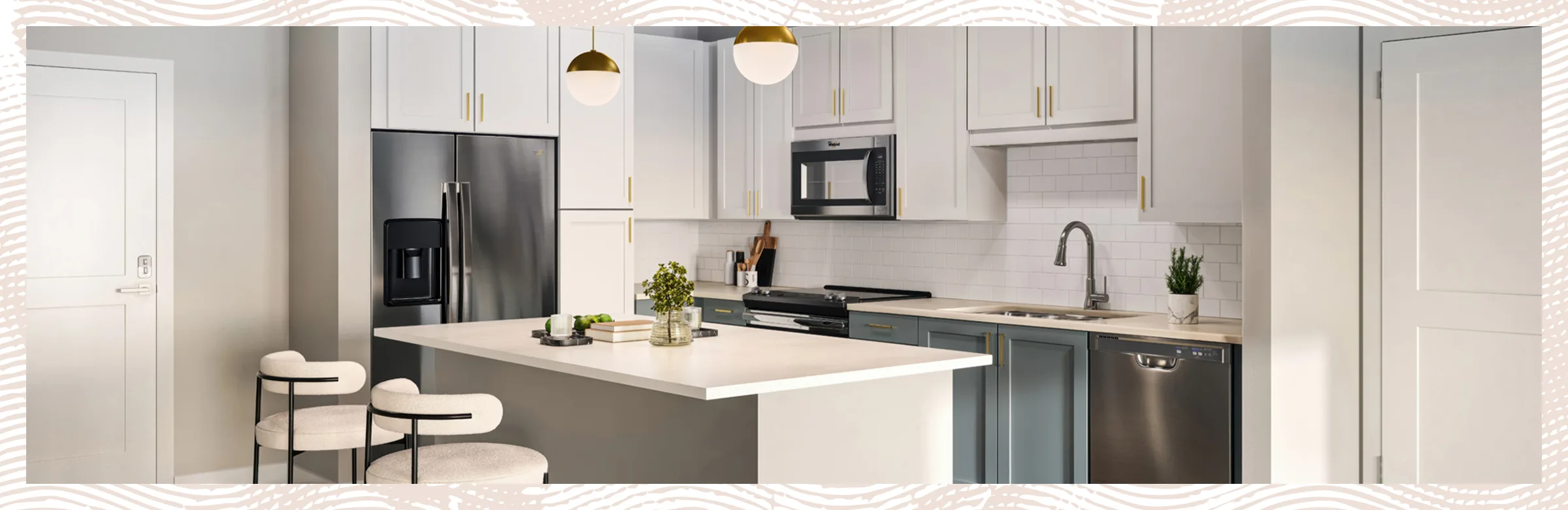 Contemporary apartment kitchen with island and stainless steel appliances